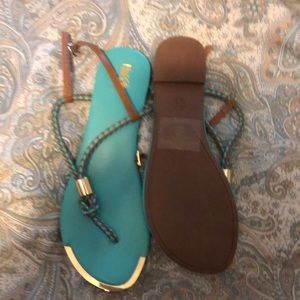 Barely worn. Teal and tan sandals